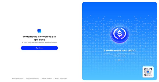 The image shows a Base app welcome screen on a computer, featuring a "Te damos la bienvenida a la app Base" (Welcome to the Base app) message with a "Continuar" button on the left, and a blue promotional panel on the right advertising "Earn Rewards with USDC" with a QR code for mobile download. This relates to the post about BaseApp now being accessible on desktop, complementing its existing mobile availability and highlighting Base's continued focus on expanding the app's accessibility.