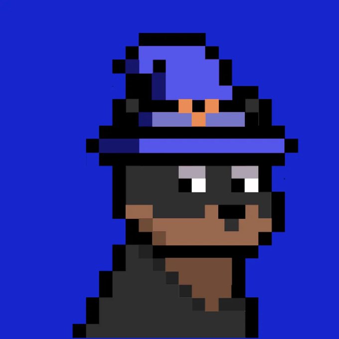 A pixel art character wearing a tall purple wizard hat, depicted with a black cloak and brown face against a solid blue background.
