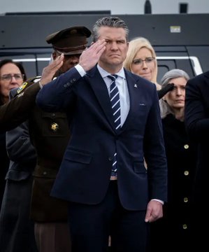 The image shows a man dressed in a suit saluting, while several other people are standing behind him. The main subject of the photo appears to be the man in the suit, who is saluting with his hand raised. The background includes more people present but not as prominent as the main subject. The post that accompanies this image discusses political news and how it relates to the global financial system. It suggests that the next winner will likely be the one who can handle real capital flows effectively rather than just being loudest or most vocal in the political arena.

The image captures a moment of respect, with the man saluting as an example of good etiquette and professionalism. The post's content seems to focus on the importance of understanding and adapting to changes within the financial world, which could be relevant for those involved in politics or other fields that deal with economic matters.