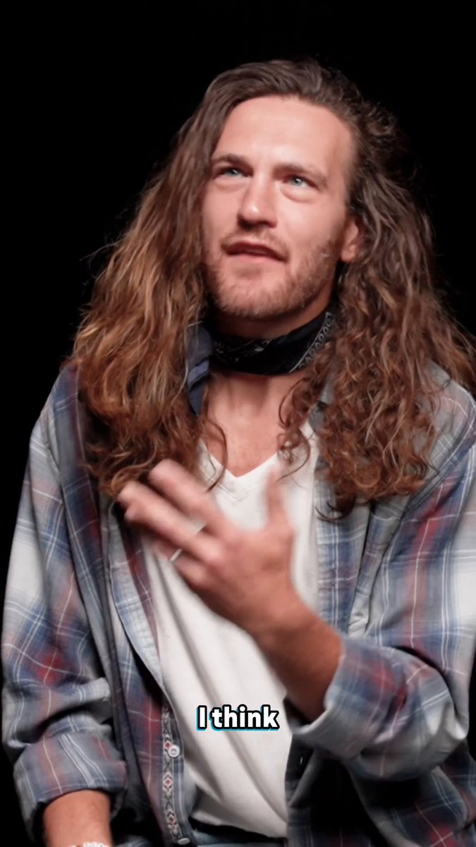 A man with long curly hair, wearing a plaid shirt and bandana, gestures while speaking with the caption "I think" displayed. The image accompanies SoFi's announcement about being the first nationally chartered bank offering cryptocurrency trading alongside traditional banking services.