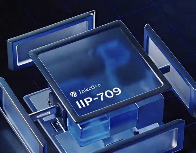 A promotional image showing a blue-themed processor chip labeled 'Injective IIP-709' surrounded by futuristic metallic components.