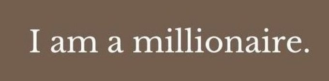 This image displays the text "I am a millionaire." The accompanying post "Manifest it." suggests that this statement is a declaration or affirmation to achieve wealth.