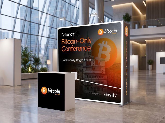 A conference booth for Poland's 1st Bitcoin-Only Conference, powered by +invity.