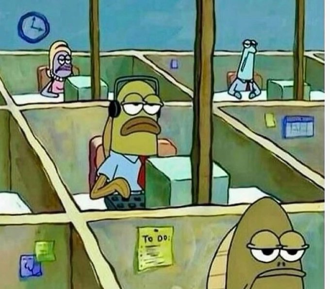 A screenshot from the animated TV show SpongeBob SquarePants depicts a tired-looking fish office worker with a headset in a cubicle, with a clock on the wall and a 'To Do' list, capturing the bleak corporate workplace vibe.