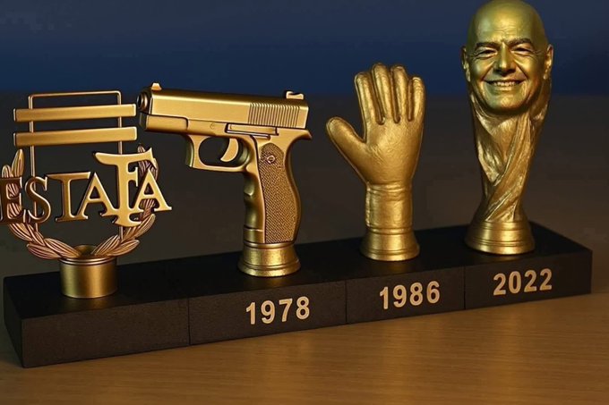 A golden trophy display commemorating FIFA World Cup victories in 1978, 1986, and 2022, likely referring to Argentina's tournament wins, juxtaposed against a critical comment accusing the team of corrupt officiating in matches against Algeria and Austria.