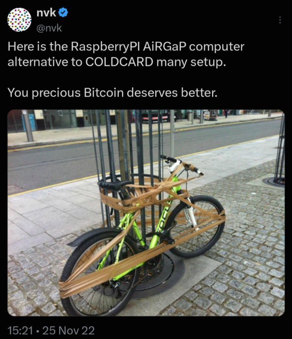 A tweet from @nvk dated November 25, 2022, jokes that strapping a Raspberry Pi with a camera to a bicycle is a better way to safeguard "precious Bitcoin" than the dedicated security hardware like COLDCARD or SeedSigner hardware wallets. The accompanying context suggests this is a tongue-in-cheek rebuttal to FUD (fear, uncertainty, and doubt) about SeedSigner, an open-source DIY Bitcoin signing device built on a Raspberry Pi.