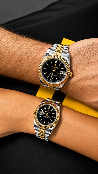 Two two-tone (gold and silver) luxury watches are displayed on matching wrists, both featuring black dials with the visible "ROFACE" text on the upper watch face, alongside a fluted gold bezel and a date window showing "28." The image plays into the caption's challenge by partially obscuring or showing only part of the brand name, inviting viewers to identify the well-known Swiss watchmaker.