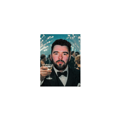 A photograph of actor Aaron Taylor-Johnson in a tuxedo holding a champagne glass, with fireworks in the background, likely from a James Bond-related event.