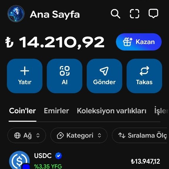 A screenshot of the Coinbase Wallet (formerly BaseApp) home page displays a Turkish-language portfolio showing a balance of ₺14,210,92 with a USDC holding valued at ₺13.947,12 (+3,35% YFG), illustrating the app's token tracking interface referenced in the accompanying post about using Coinbase Wallet to view trending tokens.