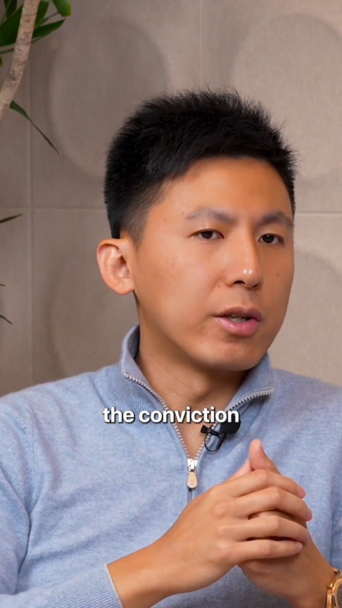 The image features a man wearing a blue sweater who appears to be talking or giving a speech. The caption of the image reads "the conviction" with an explanation about the importance of finding product-market fit first, which is related to the conviction's message.