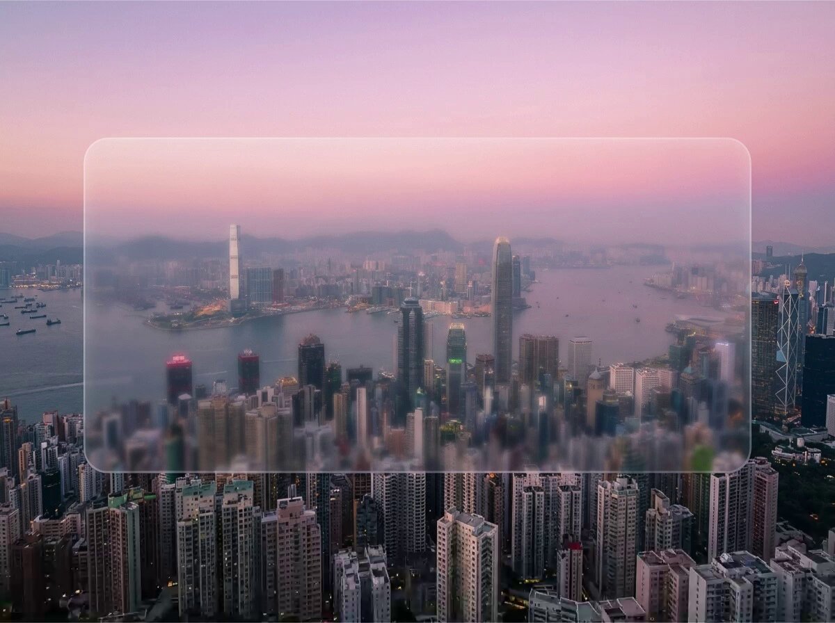 The image presents an aerial view of Hong Kong's skyline during dusk. The skyline features many tall buildings that are lit up with warm lights against the cool hues of the dusk sky. In the foreground, there's a floating advertisement for Tencent and BYD, discussing how these two companies can be tradeable onchain rather than tokens. This advertisement is placed in the lower right corner of the image, drawing attention to the content being displayed. The image also includes information about a post by Keshav Jain regarding Hong Kong equity exposure options.