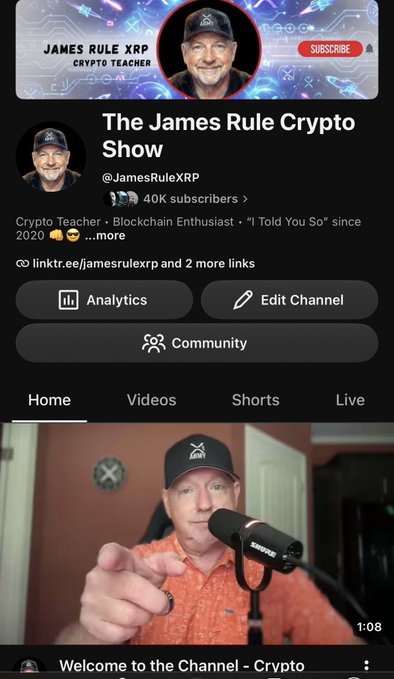 The image shows the YouTube channel page for "The James Rule Crypto Show" (@JamesRuleXRP), featuring a banner with "JAMES RULE XRP CRYPTO TEACHER" and a "SUBSCRIBE" button, with 40K subscribers celebrated in the accompanying post. Below the channel info, a video thumbnail titled "Welcome to the Channel - Crypto" shows the host wearing a black baseball cap and orange shirt, pointing at the camera while speaking into a Shure microphone.