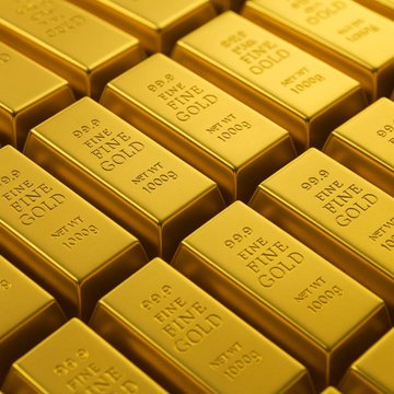 Rows of stamped 99.9 Fine Gold bars, each marked "NET WT 1000g," are neatly arranged in the image. The accompanying post highlights that Kalshi's 15-minute gold prediction markets generated nearly twice the estimated trading fees of Ether markets in September.