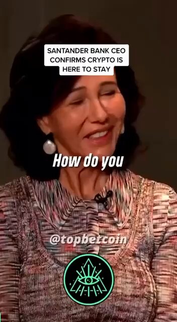 The image features a woman with a multicolored sweater wearing earrings, who appears to be smiling at the camera. The caption of the image reads "How do you?" which seems to be a question posed by someone about her thoughts on cryptocurrency or digital assets. The image also includes a green circle and a logo for #XRP, suggesting that it might be related to Bitcoin or another form of digital currency.
