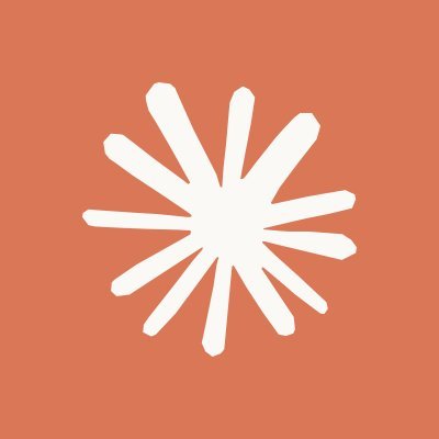 A white starburst or asterisk-like logo on a coral/orange background, likely representing Anthropic's branding. The image accompanies news about the launch of Claude Haiku 5.5, Anthropic's newest small language model.