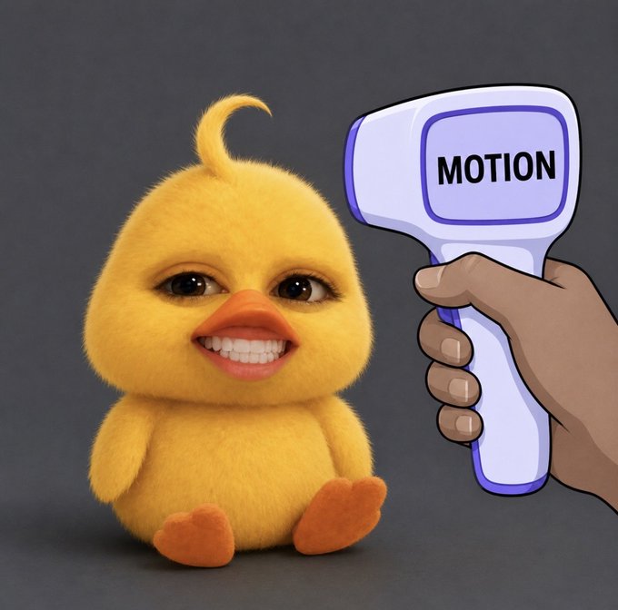 A cartoonish yellow chick with human-like features smiles while a hand holds up a device labeled 'MOTION' as if scanning it.