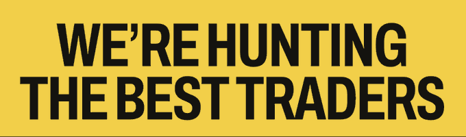 A yellow banner with bold black text reading 'WE'RE HUNTING THE BEST TRADERS'.