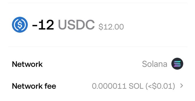 A cryptocurrency transaction receipt showing a transfer of -12 USDC ($12.00) on the Solana network with a network fee of 0.000011 SOL.