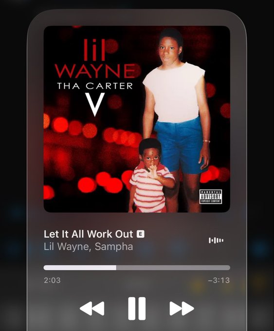 A music player interface shows Lil Wayne's 'Tha Carter V' album cover featuring a woman and child, currently playing 'Let It All Work Out' by Lil Wayne and Sampha at the 2:03 mark.