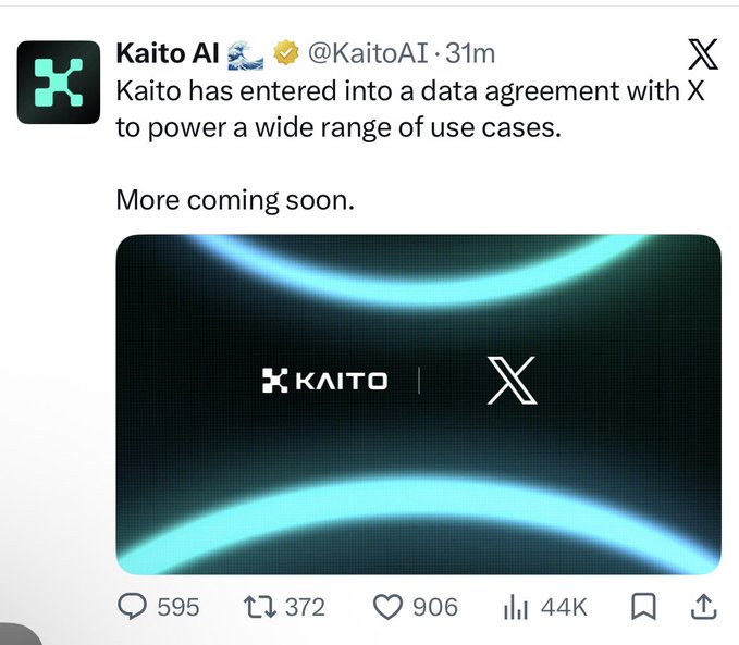 A tweet from Kaito AI (@KaitoAI) announcing a new data agreement with X (formerly Twitter), featuring logos of both brands against a glowing blue background. The post has garnered significant engagement with 906 likes, 372 retweets, and 44K views, aligning with the comment's "Hodl" sentiment suggesting long-term confidence in Kaito AI.