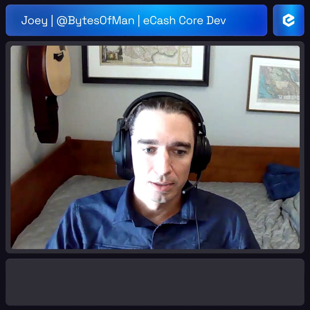 The image shows a man wearing headphones sitting at a desk with his eyes closed while looking down at something. The background features a bed, suggesting he might be working from home or taking a break during an online meeting. The caption of the image reads "Crypto moves forward because of builders who keep showing up." This statement is likely related to Bitcoin and eCash core dev, as it references the man's work in this field.