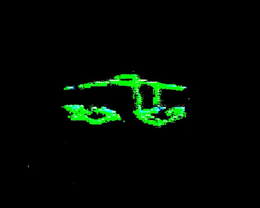 The image features a green car with two headlights, one of which appears to be glowing. The car's headlights are positioned at different angles, creating an interesting visual effect. The background of the image is black, making the car stand out even more. The text "Primitive Objkt OE ends Friday objkt.com/tokens/KT1Xuuf ...". This suggests that the image might be related to a post about primitive objects or a discussion on a specific topic.