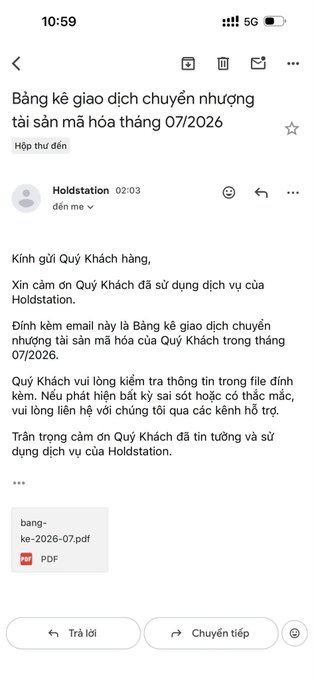 An email screenshot in Vietnamese from Holdstation, providing a customer transaction statement for July 2026 regarding cryptocurrency transfers, with an attached PDF file.