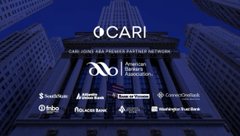The image shows the American Bankers Association building illuminated at night with a "CARI" logo banner and the text "CARI JOINS ABA PARTNER NETWORK," highlighting CARI Network's new partnership with the American Bankers Association as referenced in the accompanying post.