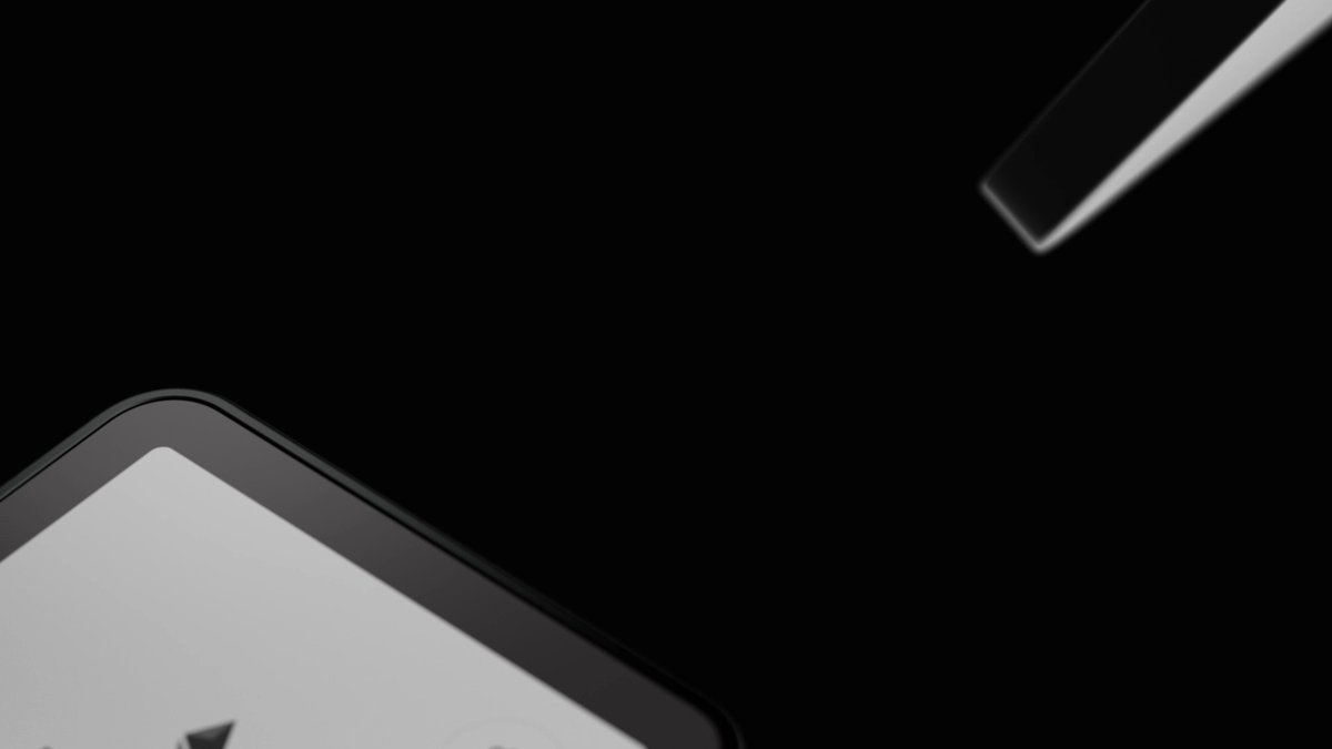 A minimalist image showing a smartphone and stylus against a black background, with only partial views visible in the frame.