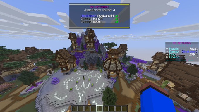 A Minecraft gameplay screenshot showing a medieval-style spawn area with multiple buildings and a 'WELCOME' pattern on the ground, with an in-game scoreboard showing 'Jugadores Online: 3' and players on the 'Draxler' team.