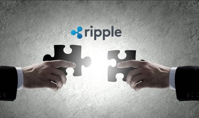 Two business hands reach toward each other from opposite sides, holding puzzle pieces that almost fit together beneath the Ripple logo, symbolizing a partnership related to the $XRP cryptocurrency.