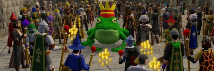 A green frog character wearing a crown stands before a diverse, animated gathering, surrounded by floating gold sparkles. The whimsical scene reflects the lighthearted, community-driven branding of the Solana token $FROG on Moby.