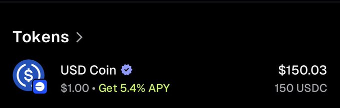 A cryptocurrency wallet interface showing 'Tokens' with USD Coin (USDC) at $150.03 / 150 USDC, offering 5.4% APY.