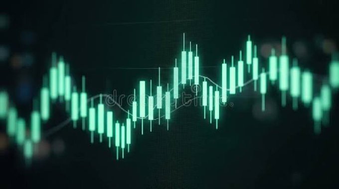 A close-up of a green candlestick stock chart displayed on a dark screen with a trend line.