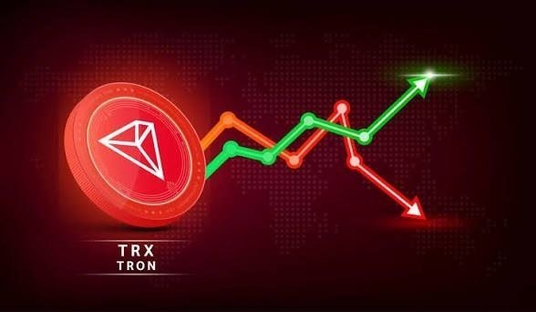 A red TRON (TRX) cryptocurrency coin is displayed next to a line graph showing volatile market fluctuations with red and green trend lines pointing in opposite directions.