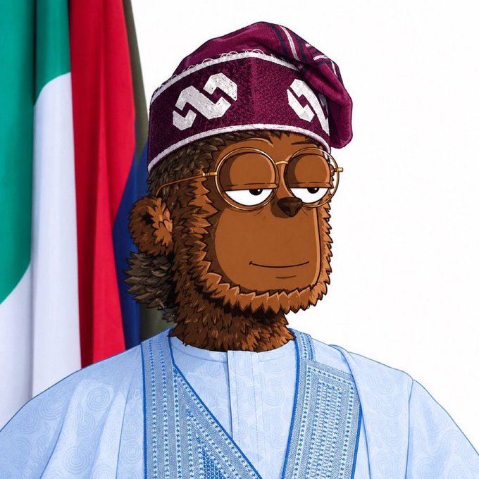 An anthropomorphic cartoon bear wearing round glasses, a maroon patterned hat, and a light blue embroidered traditional outfit stands in front of what appears to be the UAE flag, striking a relaxed "gm" (good morning) vibe for fellow crypto frens.