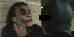 A heavily blurred and distorted image showing what appears to be a figure or scene with indiscernible details due to motion blur.