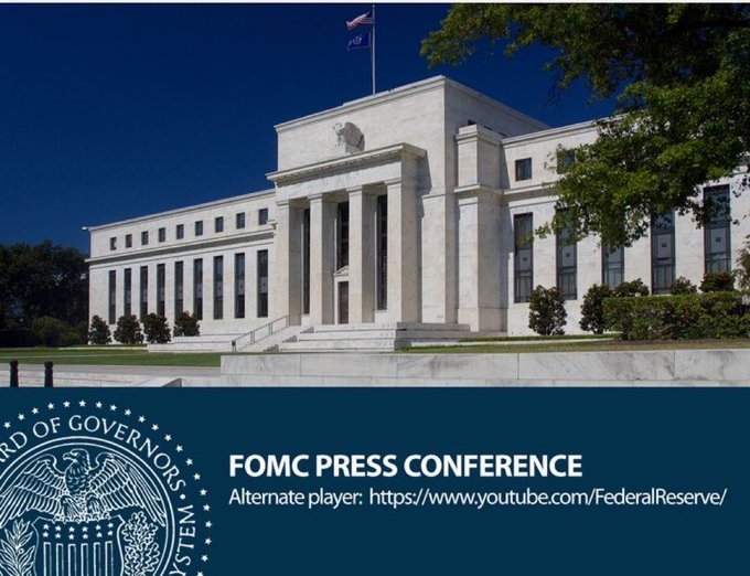 The Federal Reserve building is shown with a banner reading "FOMC PRESS CONFERENCE" and "Alternate player: https://www.youtube.com/FederalReserve/".