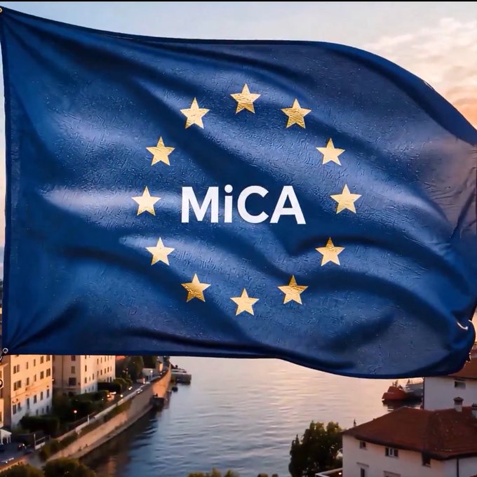 The image shows a European Union-style flag with gold stars and the text "MiCA" across the center, waving over a riverside cityscape at dusk. The flag symbolizes Injective's MiCA whitepaper release, representing its regulatory compliance framework for expanding the $INJ ecosystem within the EU.
