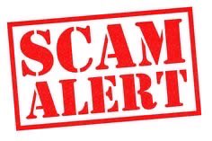 A red stamp-style graphic with bold white text reading 'SCAM ALERT'.