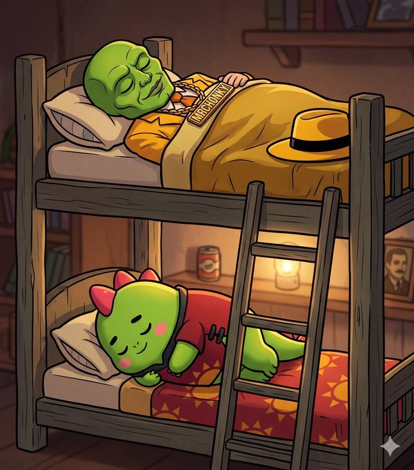 The image features a cartoon scene of two green dinosaurs, one sleeping peacefully on a bed while the other dinosaur is awake and looking around. The scene takes place in a room with a bunk bed, which has a ladder leading up to it. There are also books scattered throughout the room, suggesting that this space could be used for reading or studying as well. The image seems to be promoting the idea of taking breaks from screens and focusing on restful activities like sleeping, rather than constantly engaging in screen-based tasks.