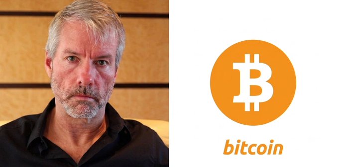 A man with gray hair and a beard in a black shirt, pictured beside the orange Bitcoin logo and the word 'bitcoin'.