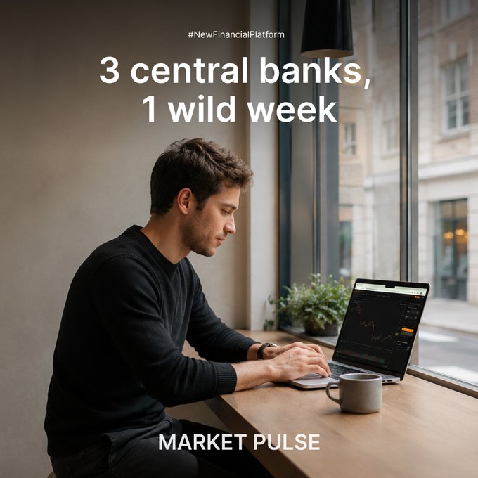 A marketing image showing a man working on a laptop displaying a trading chart by a window, with overlay text '#NewFinancialPlatform', '3 central banks, 1 wild week', and 'MARKET PULSE'.