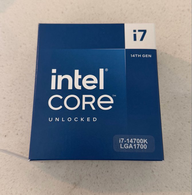 A blue box for an Intel Core i7-14700K 14th Gen processor (LGA1700) sits on a speckled countertop.