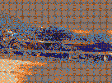 A heavily distorted, glitchy image showing a scene with orange and blue colors, overlaid with a grid pattern.