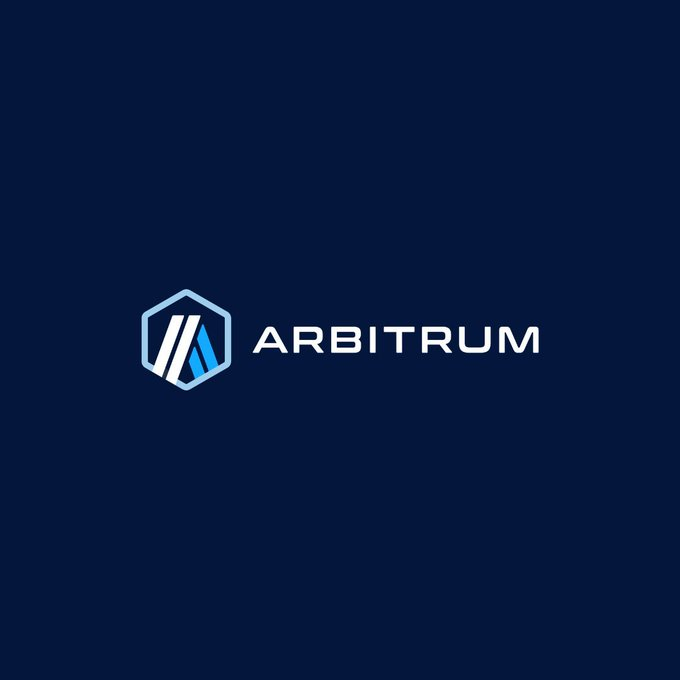 The Arbitrum cryptocurrency logo displayed on a dark navy blue background, featuring a geometric icon in a hexagon next to the 'ARBITRUM' wordmark in white.