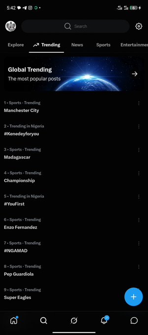 A screenshot of the X (formerly Twitter) mobile app shows the 'Trending' tab, with 'Manchester City', 'Kenedeyoforyou', and '#NGAMAD' among the top trends.