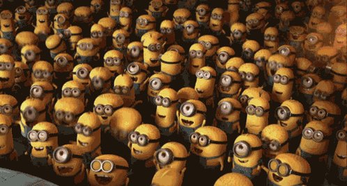 !!!!!!! minion cartoon characters with yellow bodies and black faces, standing on a gray background.