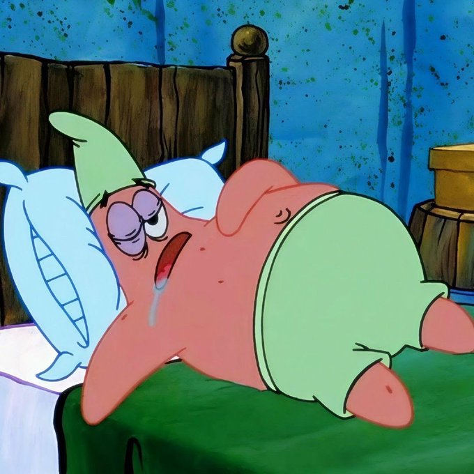 Patrick Star lies in bed drooling and dreaming, blissfully unaware of the world, perfectly illustrating how a lazy weekend morning feels when you have $500 to spend however you want. The post's playful tone is matched by the image's humor of indulging in weekend relaxation on a budget.