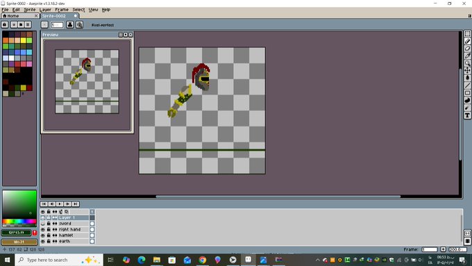 A screenshot of Aseprite, a pixel art editor, displaying a small sprite of a character on a transparent checkerboard background.